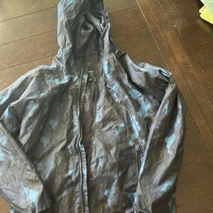 Rain jacket Light and dark blue pattern with zipper pockets